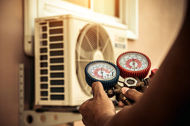 Professional Hvac technician working in Brookline Village, MA